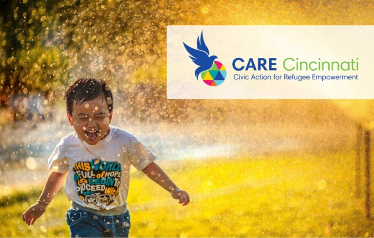 Boy playing in sprinkler with CARE-Cincinnati logo overlay